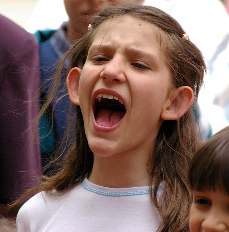 Photo of girl shouting.